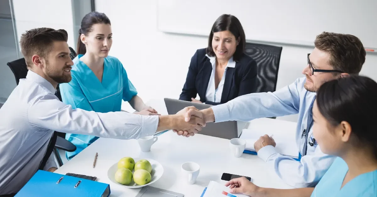 doctors-shaking-hands-with-each-other z-01